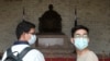 People wear face masks to protect against the spread of the new coronavirus at Chiang Kai-shek Memorial Hall in Taipei, Taiwan, Feb. 27, 2020. 