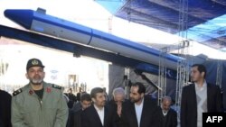 Secretary of State Hillary Clinton greets Kofi Annan and his wife Nane Lagergren at the funeral of Ghana President John Atta Mills, in Accra, Ghana, August 10, 2012.