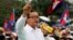 FILE - Sam Rainsy, shown at a Phnom Penh rally in 2013, says his Cambodian National Rescue Party would support Hang Puthea as the ninth, neutral member of the National Election Committee.