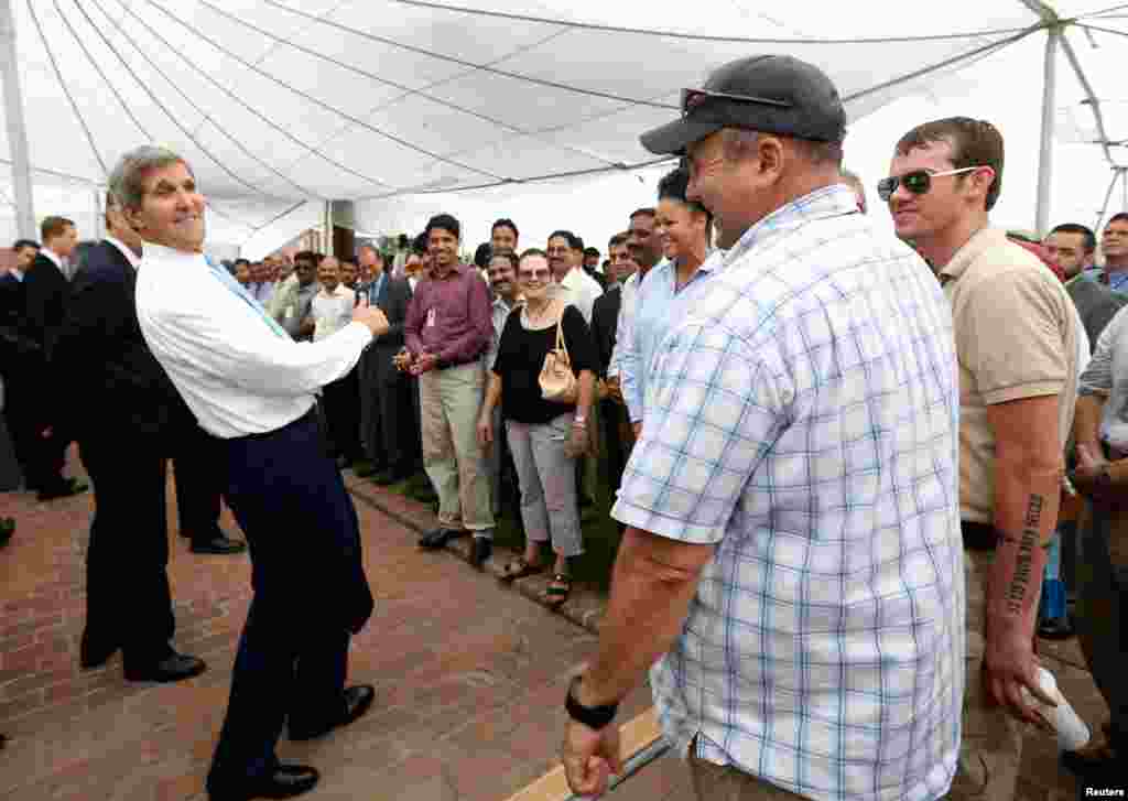 U.S. Secretary of State John Kerry meets staff at the U.S. Embassy in Islamabad August 1, 2013.&nbsp;