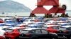 Sports utility vehicles (SUVs) waiting to be exported are seen at a port in Lianyungang, Jiangsu province, China, April 5, 2018. 