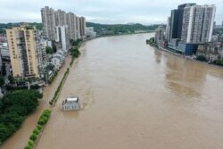 四川省内江市的沱江在连续的暴雨之后。（2020年8月18日）