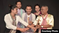 Cambodian Living Arts’ Khmer Magic Music Bus artists. From left to right: Seyma Thorn; Savang Thoch; Cambodian Living Arts’ founder, Arn Chorn-Pond; Mao Men; and master artist Mann Men. (Courtesy Photo)