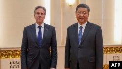 Američki državni sekretar Entoni Blinken i kineski predsednik Ši Đinping (Foto: AFP/Mark Schiefelbein)