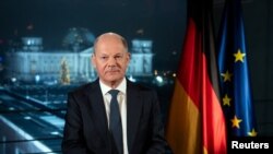 German Chancellor Olaf Scholz records his New Year's speech at the chancellery in Berlin