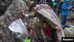 A supplied image of Royal New Zealand Army officer Colonel Glenn King lays a wreath during the Indigenous Anzac Day commemoration event held on Mount Ainslie in Canberra, Australia, April 25, 2017. 