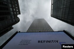 An advertisement for Refinitiv is seen on a screen in London's Canary Wharf financial centre, London, Britain, Oct. 2, 2018.