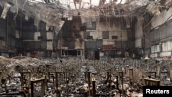 The auditorium of Eliot Arts Magnet Middle School lies in ruins after wildfires swept through Altadena, California, Jan. 9, 2025.