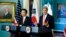 U.S. Secretary of State John Kerry (R) and South Korea's Foreign Minister Yun Byung-se talk to reporters about the 2+2 Ministerial meetings, at the State Department in Washington, Oct. 24, 2014.