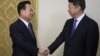 Choe Ryong Hae, left, vice chairman of the Central Committee of North Korea's ruling party shakes hands with Song Tao, head of China's ruling Communist Party's International Liaison Department, in Pyongyang, Nov. 17, 2017. 