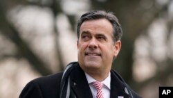 FILE - John Ratcliffe, then the director of national intelligence, waits to board Marine One with then-President Donald Trump at the White House in Washington, Dec. 12, 2020. Ratcliffe has been selected to become CIA director in Trump's second term.