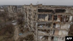 Fotografija uništenih zgrada u Izumu, nastala 1. februara 2024. (Foto: AFP/Roman Pilepy)