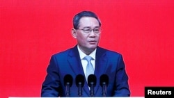 Screen shows Chinese Premier Li Qiang delivering a speech at the opening ceremony of China Development Forum (CDF) 2024, in Beijing