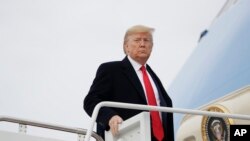 President Donald Trump boards Air Force One in Andrews Air Force Base, Md., Jan. 23, 2020. 