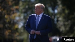 Predsednik Donald Tramp na južnom travnjaku Bele kuće, pred odlazak u Filadelfiju (Foto: Reuters/Tom Brenner)