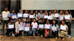 Srey Bandaul seen here with a group of art students after they finished a learning program with him. (Courtesy of Phare Ponleu Selapak)