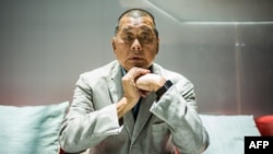 Taipan media Jimmy Lai berpose saat wawancara dengan AFP di kantor Next Digital di Hong Kong. (Foto: AFP)