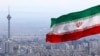 FILE - Iran's national flag flies over Tehran, Iran, March 31, 2020. 