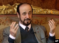 FILE - Rifaat Assad, an exiled uncle of Syrian President Bashar Assad, speaks during an interview in Paris, France, Nov. 15, 2011.