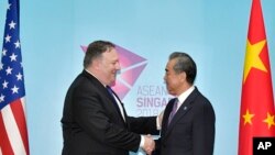 Američki državni sekretar Majk Pompeo i kineski šef diplomatije Vang Ji