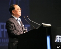 香港特首曾荫权称香港为内地走向国际搭桥