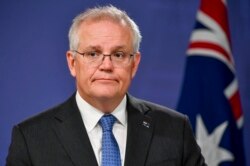 Perdana Menteri Australia Scott Morrison berbicara kepada media di Sydney, Australia, Senin, 19 April 2021. (Foto: AP)