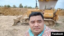 Sok Oudom, pictured at a construction site, is the owner of Rithysen radio station and a local citizen journalist in Kampong Chhnang province, Cambodia. (Courtesy of Facebook)