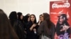 Perempuan Saudi berkumpul di sebuah bioskop di pusat perbelanjaan Riyadh Park setelah pemerintah Arab Saudi membuka bioskop untuk umum, di Riyadh, 30 April 2018.