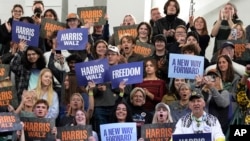 Supporters cheer as Democratic presidential nominee Vice President Kamala Harris speaks during a campaign rally at Jenison Field House on the campus of Michigan State University, in East Lansing, Michigan, Nov. 3, 2024