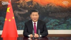 This video grab taken on Jan. 25, 2021, from the website of the World Economic Forum shows China's President Xi Jinping speaking from Pekin as he opens an all-virtual World Economic Forum, which usually takes place in Davos, Switzerland.