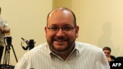 FILE - Iranian-American Washington Post correspondent Jason Rezaian. Iran said Sunday it has sentenced detained Rezaian to an unspecified prison term following his conviction last month on espionage charges.