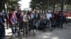 FILE - Journalists gather for a news event at Shahr-e-Naw Park in Kabul, Afghanistan, April 30, 2019. Since the Taliban's return to power, there has been a crackdown of independent media in Afghanistan. 