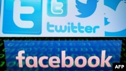 美国社交媒体公司脸书和推特的标志。