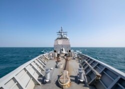 The Ticonderoga-class guided-missile cruiser USS Chancellorsville (CG 62) transits the Taiwan Strait, Nov. 12, 2019, in this photo made available by U.S. Navy.