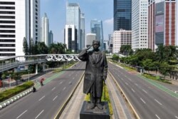 Foto yang menunjukkan jalan-jalan yang sebagian sepi di Jakarta pada 3 Juli 2021, karena Ipemerintah memberlakukan PPKM karena varian Delta. (Foto: AFP/Bay ismoyo)