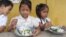 The program feeds about 150,000 primary school students, with help from a US grant of $20 million, in the provinces of Battambang, Kampong Thom and Siem Reap.
