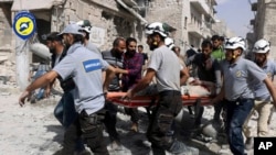 Ma'aikatan White Helmets suna ceton mutane