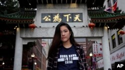 FILE - Activist Frances Hui, posing in the Chinatown neighborhood of Boston, Massachusetts, on Oct. 2, 2019, is now the policy and advocacy coordinator for the Committee for Freedom in Hong Kong Foundation. Hong Kong imposed a bounty worth $127,635 on her in December 2023.