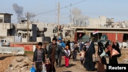 逃离摩苏尔以北战火的伊拉克平民（2016年12月30日）