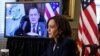 Wakil Presiden Kamala Harris mencatat saat berdiskusi soal penanganan imigran melalui konferensi video dengan Presiden Guatemala Alejandro Giammattei, dari Gedung Putih, Washington, 26 April 2021. (Foto: Evelyn Hockstein/Reuters)