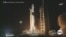 Modern-day moonshot blasts off from Earth