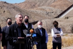 FILE - House Minority Leader Kevin McCarthy speaks to the press during a tour for a delegation of Republican lawmakers of the US-Mexico border, in El Paso, Texas, March 15, 2021.