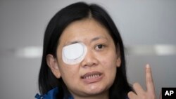 Veby Mega Indah, jurnalis asal Indonesia, saat diwawancarai Associated Press di kawasan Wan Chai, Hong Kong, 4 Desember 2019. (Foto: AP)