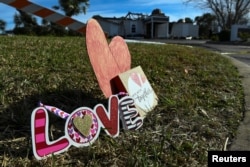 Signs rest outside the Victoria Islamic Center a day after a fire destroyed the mosque in Victoria, Texas, Jan. 29, 2017.