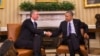 President Barack Obama shakes hands with NATO Secretary General Jens Stoltenberg during their meeting in the Oval Office of the White House in Washington, Monday, April 4, 2016. 