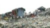 Shelters are seen amid mounds of trash at Dangkor Landfill, in Phnom Penh, Cambodia, Dec. 31, 2019. (Tum Malis/VOA Khmer)
