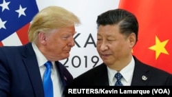 Američki predsednik Donald Tramp prilikom susreta sa kineskim predsednikom Ši Đinpingom na samitu G20 u Osaki, u Japanu, 29. juna, 2019.
Foto:Rojters/Kevin Lamark