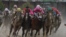 Luis Saez riding Maximum Security, second from right, goes around turn four with Flavien Prat riding Country House, left, Tyler Gaffalione riding War of Will and John Velazquez riding Code of Honor, right, during the 145th running of the Kentucky Derby ho