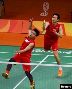 Mohammad Ahsan dan Hendra Setiawan saat berlaga di olimpiade bulu tangkis ganda pria di Rio de Janeiro, Brazil, 2016.