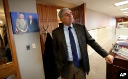 Outgoing chairman of the Nebraska Democratic Party Vincent Powers stands in his law office in Lincoln, Nebraska, Jan. 3, 2017.